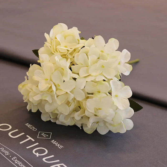 Artificial Hydrangea Floral Bunch with lifelike silk blooms for home decoration and weddings.