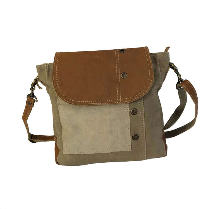 Eco-friendly khaki shoulder bag with tan leather flap, made from upcycled materials, perfect for everyday use.