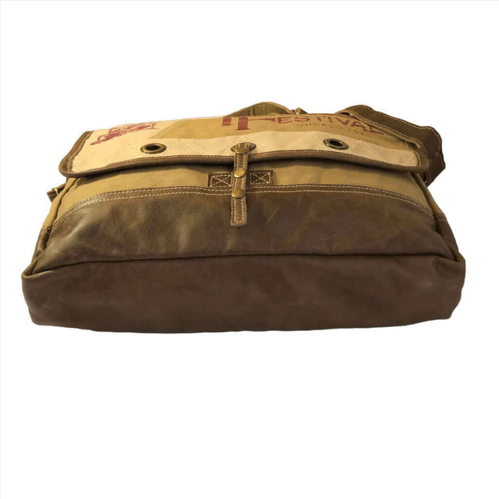 Music festival messenger bag with upcycled canvas and leather design, stylish and spacious for eco-friendly use.