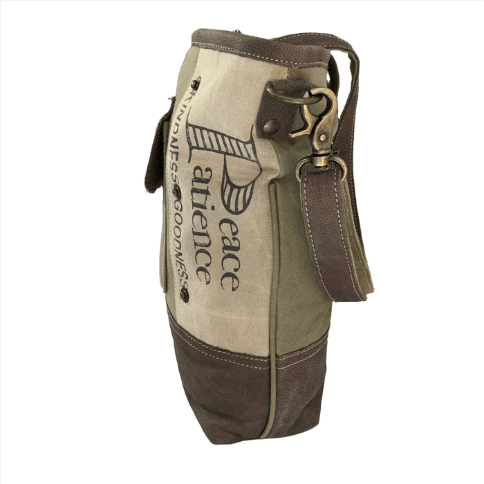 Upcycled canvas and leather crossbody bag featuring 'Peace and Patience' design, ideal for daily use and style.