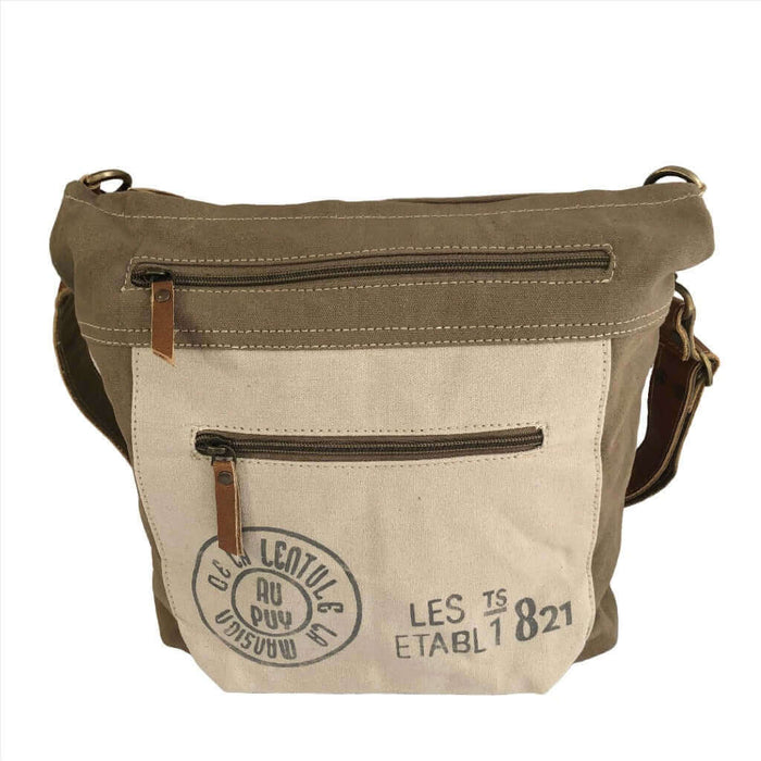 Upcycled canvas shoulder bag with adjustable leather strap and multiple pockets, eco-friendly design by Au Puy.