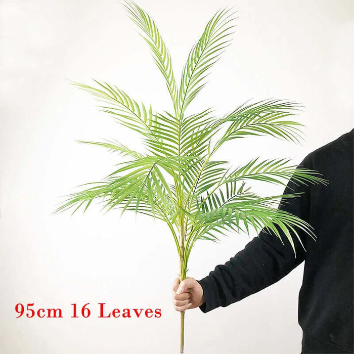 Artificial Monstera plants 95cm tall with 16 green leaves, perfect for home decor and event spaces.