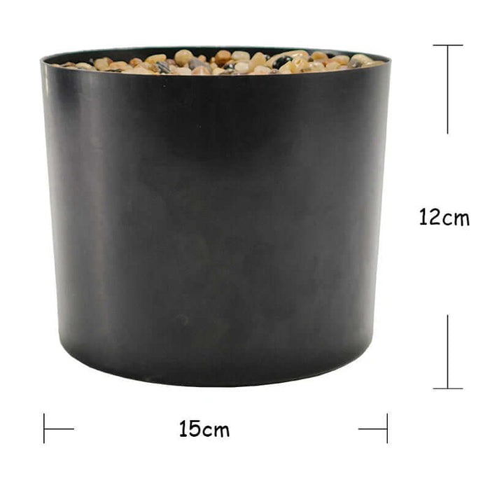 Image of a black pot measuring 12cm in height and 15cm in diameter with pebbles on top, ideal for artificial monstera plants.