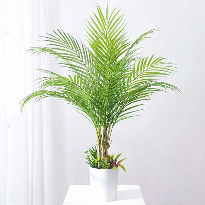 Elegant artificial monstera plants adding tropical greenery to home décor, perfect for any setting.