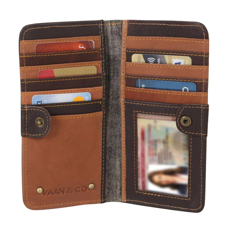 Bifold wallet grey and black leather and canvas open, showing card slots and ID window.