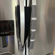 Stainless steel refrigerator with black and white checkered handles