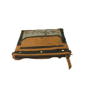 Canvas leather crossbody bag featuring sturdy construction and multiple pockets for organization.