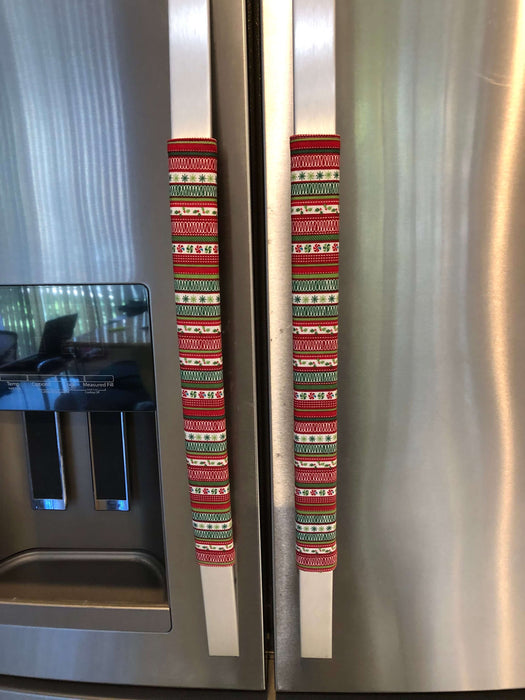 Gnomes on The Green Christmas Appliance Handle Covers on refrigerator handles, festive kitchen decoration in red and green.