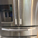 Grey leaf motif appliance handle covers on stainless steel fridge for enhanced grip and cleanliness.
