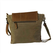 Eco-friendly khaki shoulder bag with tan leather flap and adjustable strap, perfect for everyday use.