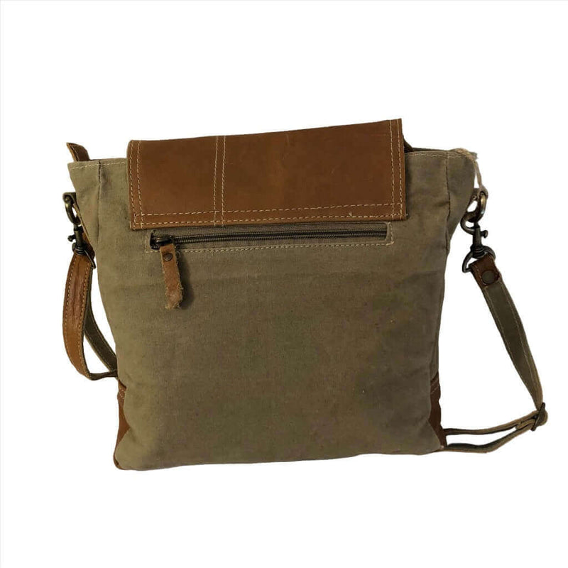 Eco-friendly khaki shoulder bag with tan leather flap and adjustable strap, perfect for everyday use.