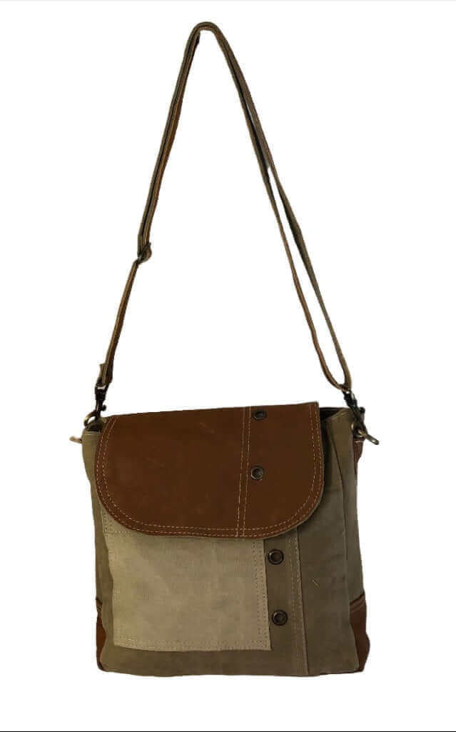 Eco-friendly khaki shoulder bag with tan leather flap, adjustable strap and functional pockets for everyday use.