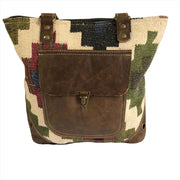 Multi color canvas tote bag with leather pocket, stylish and eco-friendly, perfect for everyday use.