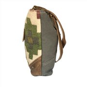Multi Color Canvas Tote Bag With Leather Pocket side view showcasing mixed-media design and spacious interior.