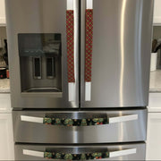 Stainless steel refrigerator with decorative handle covers and trim