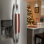 Red and green plaid handle covers on a stainless steel refrigerator.
