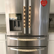 Plaid-patterned handle covers on a fridge showing front and back.