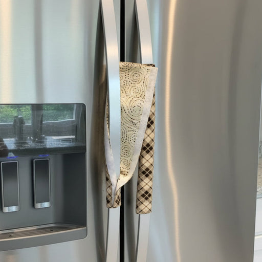 Brown and beige plaid fridge handle covers showing reverse.