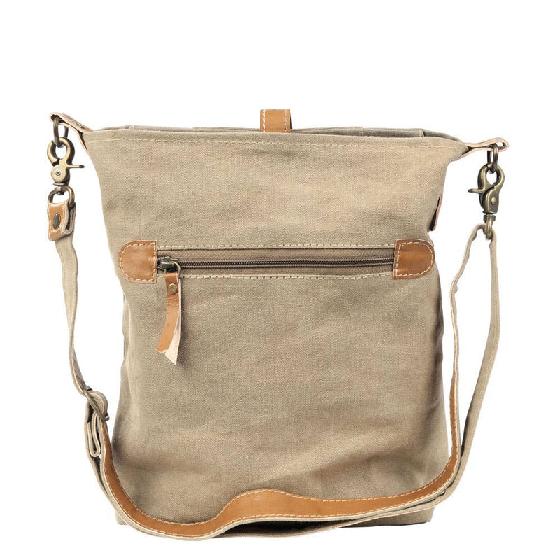 Cute Canvas Leather Crossbody Bag With Buckle showcasing a spacious design and secure zippered back pocket.
