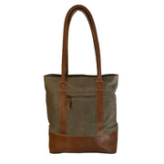 Canvas Tote Bag With Leather Trim showcasing a sturdy design and spacious interior, perfect for stylish everyday use.