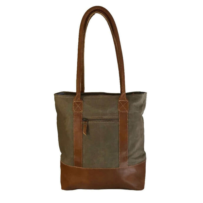 Canvas Tote Bag With Leather Trim showcasing a sturdy design and spacious interior, perfect for stylish everyday use.