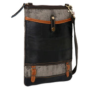 Repurposed canvas crossbody bag featuring sturdy leather accents and a zipper-top design for style and functionality.