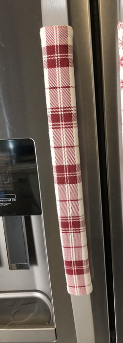 Gnomes on The Green Christmas Appliance Handle Covers in red and white plaid design on a refrigerator handle.