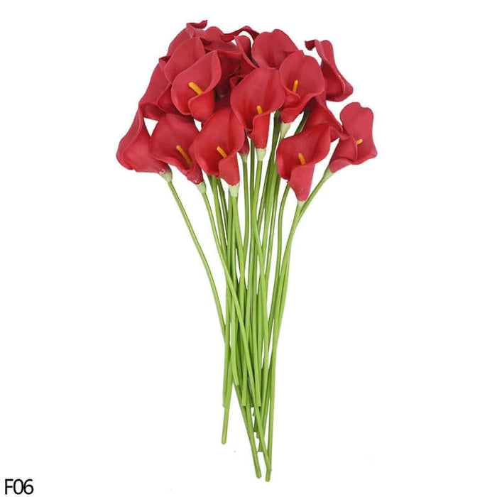 Bunch of 10 red real-touch calla lily artificial flowers on green stems for home decor and events.
