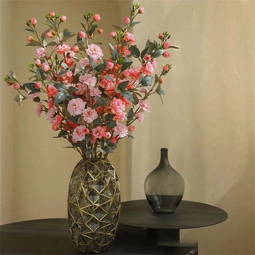 Artificial Camellia tall stems in a stylish vase, adding elegance to home decor.