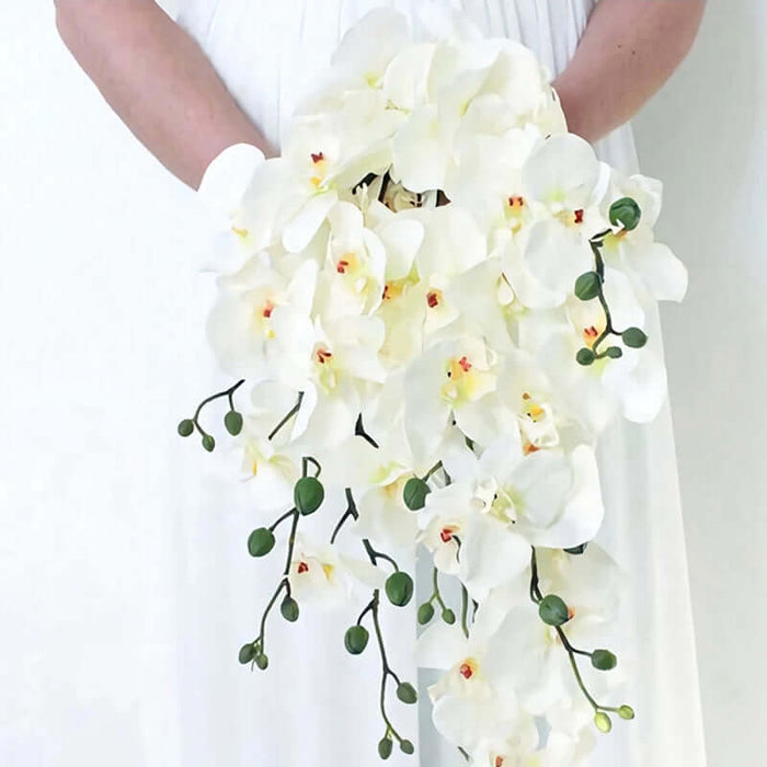 Stunning artificial orchid bouquet featuring white flowers and green buds, perfect for home decor and special occasions.