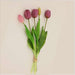 Soft silicone artificial tulip bouquet in pink and purple hues with green leaves, perfect for home decor and events.