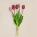 Soft silicone artificial tulip bouquet in pink and purple hues with green leaves, perfect for home decor and events.