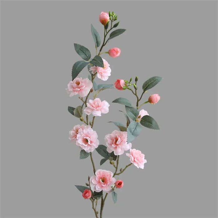 Realistic pink Camellia stem artificial flowers with green leaves, perfect for home decor or events.