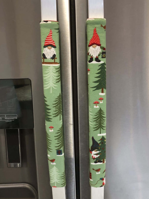 Gnomes on The Green Christmas Appliance Handle Covers on refrigerator handles featuring festive gnome designs.
