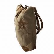 Brown backpack with star design on a white background