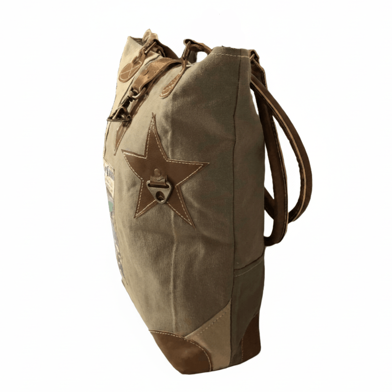 Brown backpack with star design on a white background