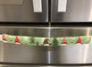Gnomes on The Green Christmas Appliance Handle Covers in a festive kitchen setting.