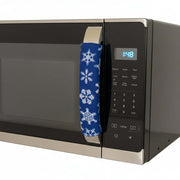 Blue handle cover with a snowflake pattern on a microwave handle.