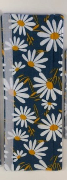 Stylish 14 '' size option blue appliance handle covers featuring white and yellow daisies, adding modern décor and protection