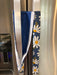 Stylish blue appliance handle covers featuring white and yellow daisies, showing blue backing for modern décor and protection