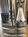 Stylish blue appliance handle covers set with towel featuring white and yellow daisies, adding modern décor and protection
