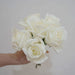 Artificial latex rose bouquet - Stunning white roses in a hand for elegant floral decor.