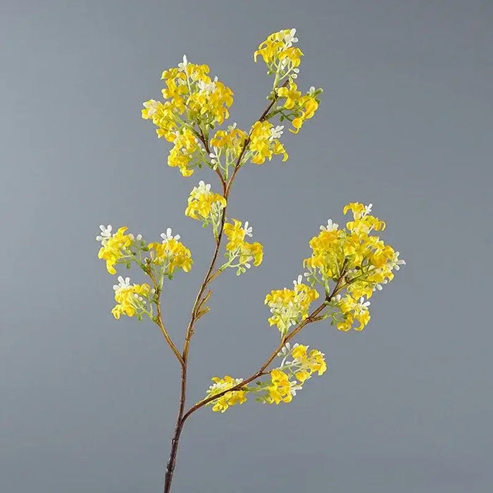 Artificial osmanthus tall stems featured against a grey background for home decor.
