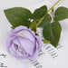 Artificial real-touch rose flower stems with lavender bloom and green leaves on elegant background.