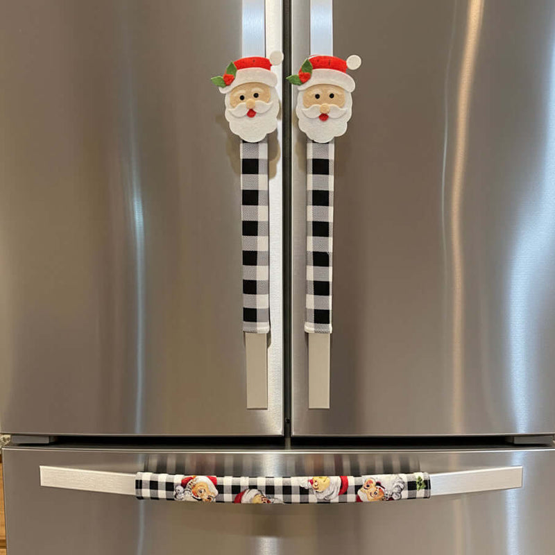Stainless steel refrigerator with decorative Christmas-themed handles
