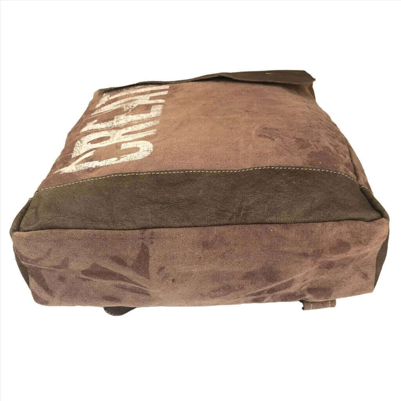 Canvas and Leather Backpack- Stylish Functional CREATE side view showing rugged material and minimalist design.