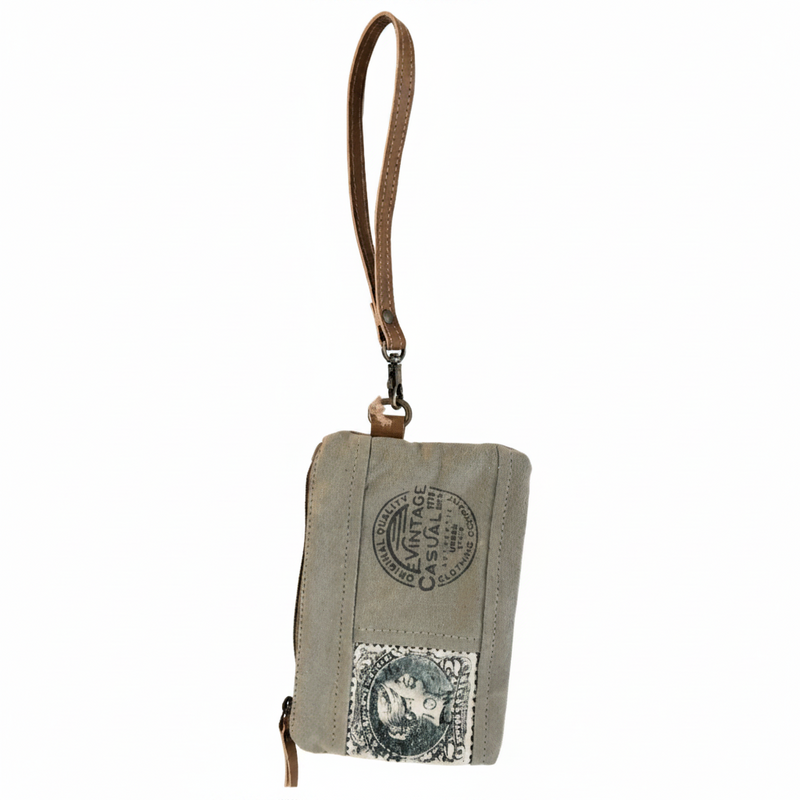 Upcycled military canvas wristlet pouch with stamp print, full product view on neutral background.
