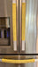 Cute puppy print on appliance handle covers enhancing a refrigerator's aesthetic with playful yellow color.
