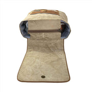 Eco-friendly canvas backpack with a spacious interior and stylish design, showcasing the upcycled materials used.