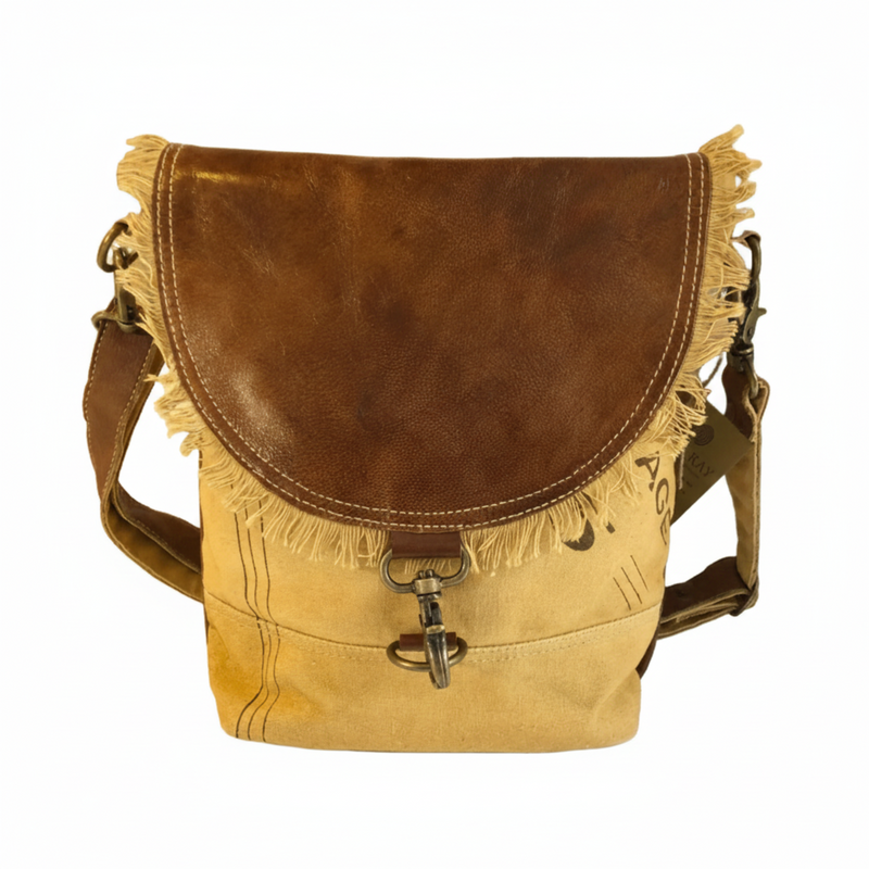 Eco-friendly Canvas Leather Flap Shoulder Bag featuring a leather flap and fringed edges in a stylish design.